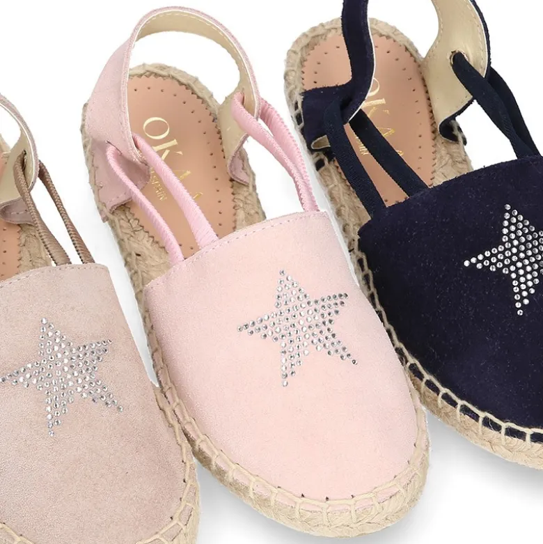Alpargata niña con ESTRELLAS y elásticos en piel serraje.