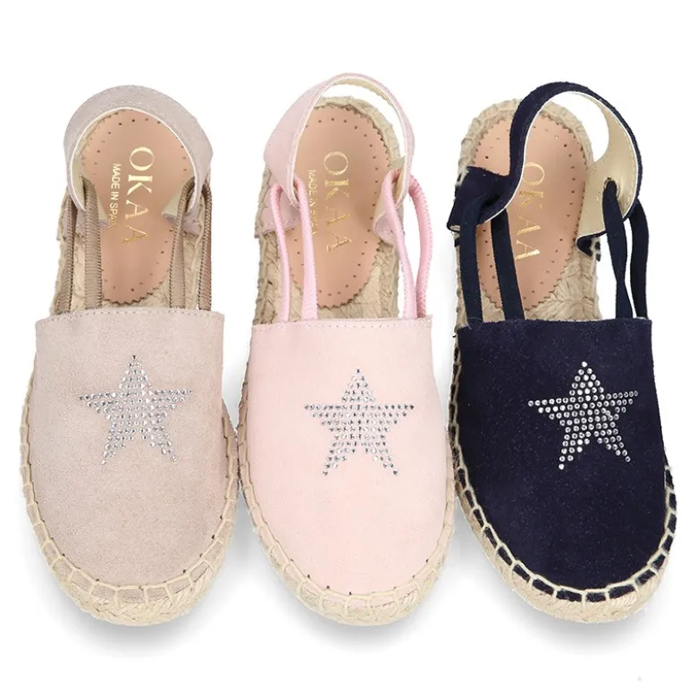 Alpargata niña con ESTRELLAS y elásticos en piel serraje.