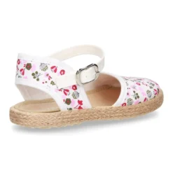 Alpargata niña con hebilla en lona con estampado de FLORES.