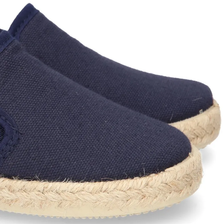 Alpargata niños con elásticos tipo slip on en lona con CUADROS.