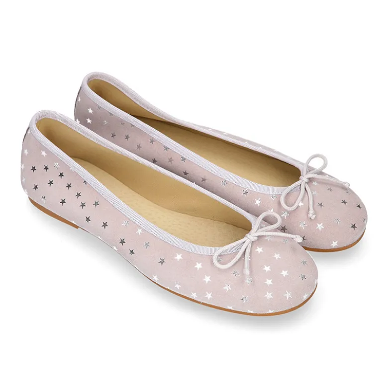 Bailarina clásica con lazo y estrellas en serraje