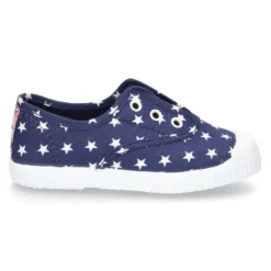 Bamba de lona con ESTRELLAS, elástico y puntera de goma.