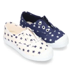 Bamba de lona con ESTRELLAS, elástico y puntera de goma.