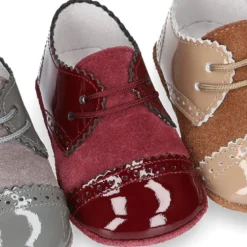 Blucher bebé combinado en piel charol con serraje.
