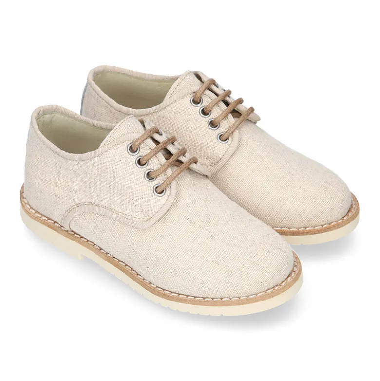 Blucher de niño ceremonia en lino natural en colores de moda.