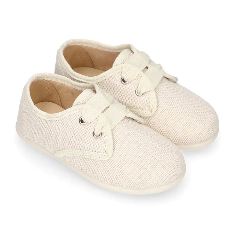 Blucher niño ceremonia en lona lino en color beige.