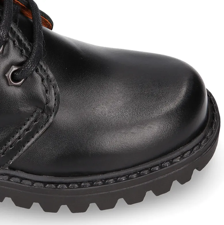 Bota niños COLE tipo todoterreno con cordones en piel.