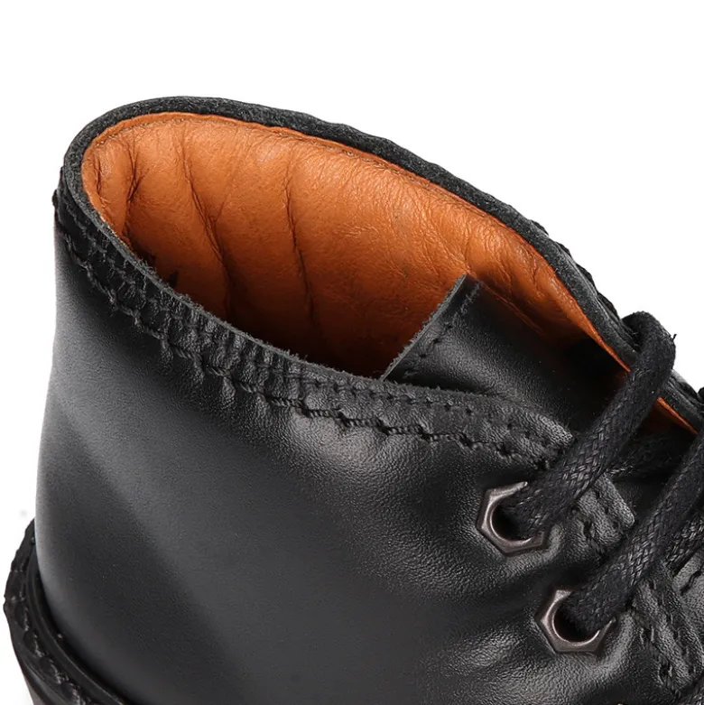 Bota niños COLE tipo todoterreno con cordones en piel.