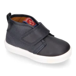 Bota niño tipo zapatilla sin cordones en piel ccmbinada con lona.
