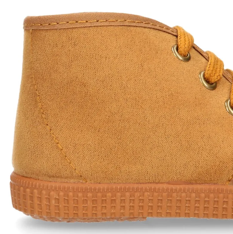 Botita niños CASUAL con cordones en Serratex.
