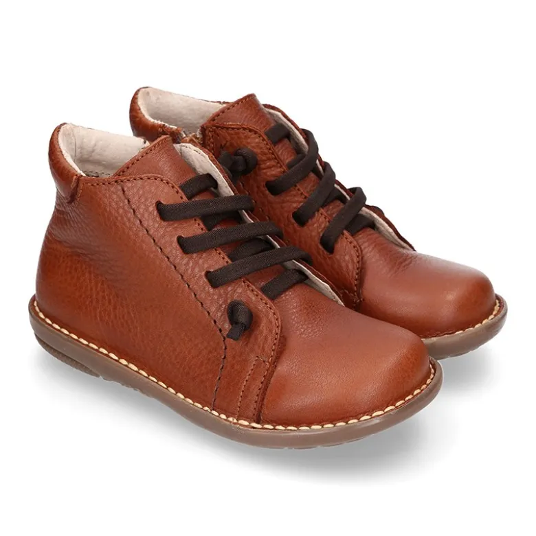 Botita niños SPORT con cremallera y cordones elásticos en piel.