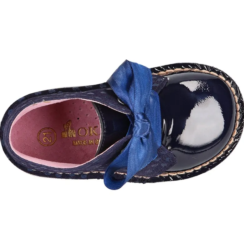 Botita Safari niña con lazos y estampado de corazones en piel charol combinado con serraje.