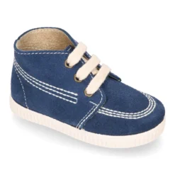 Botitas casual con cordones en piel Serraje.
