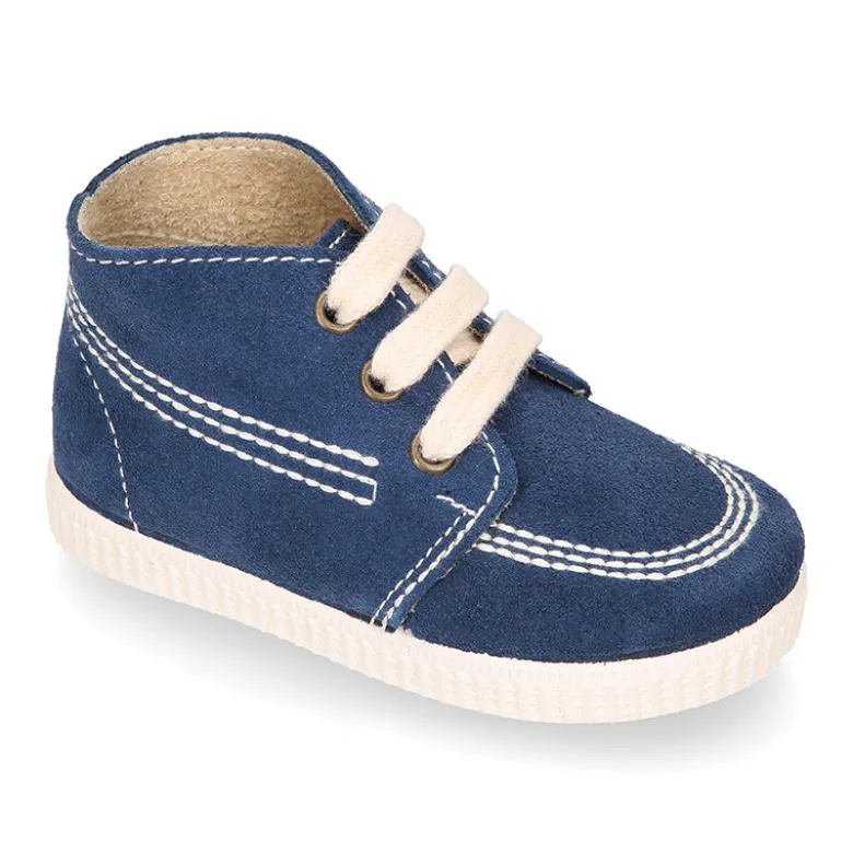 Botitas casual con cordones en piel Serraje.