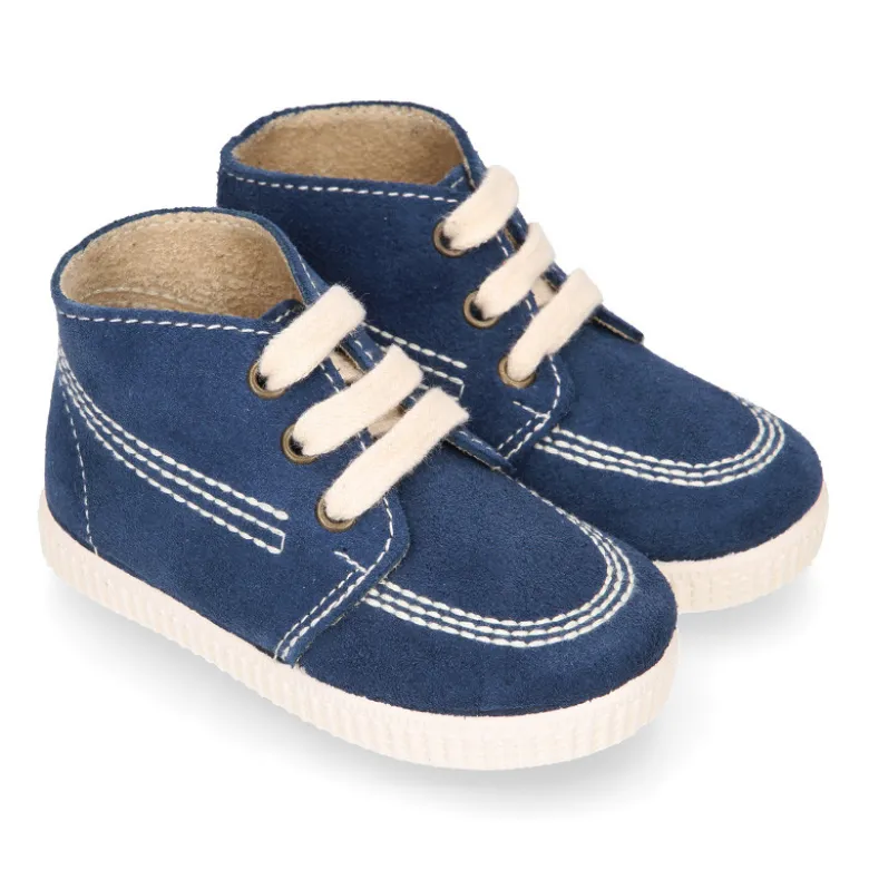 Botitas casual con cordones en piel Serraje.