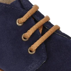 Botitas casual niño con cordones en piel serraje.