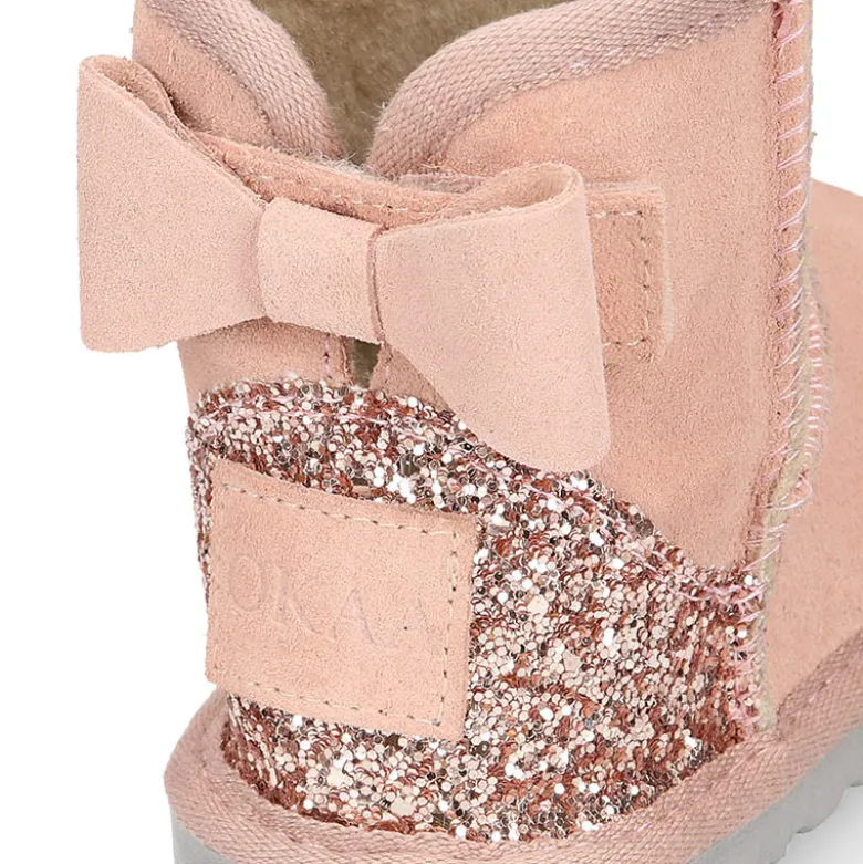 Botitas niña tipo Australianas niña en piel serraje con LAZO y GLITTER.