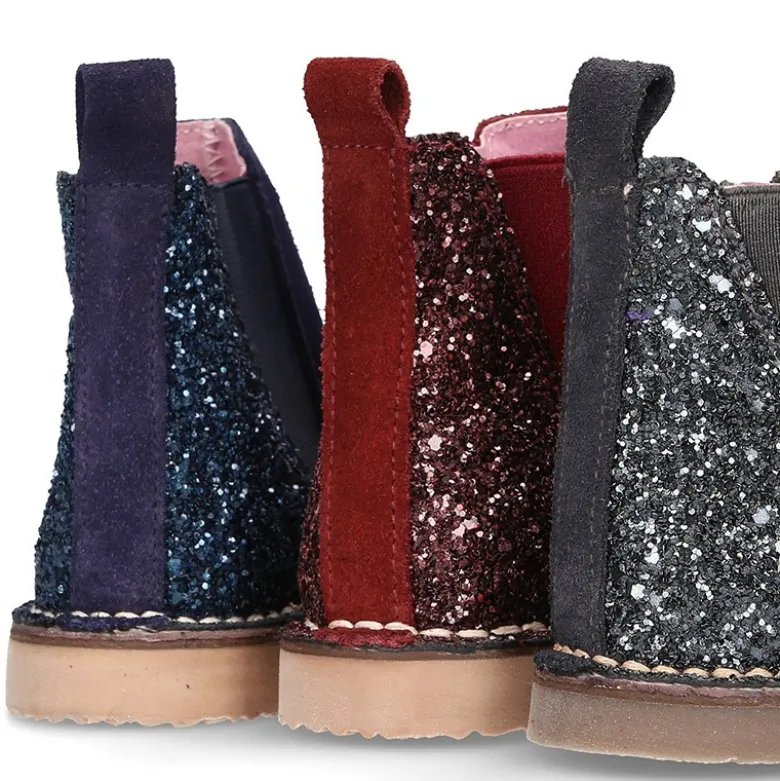 Botín con elástico y cremallera con talonera en GLITTER.