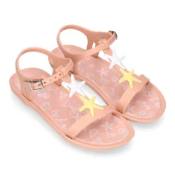 Cangrejera niña tipo sandalia en forma de T con ESTRELLAS en rosa.