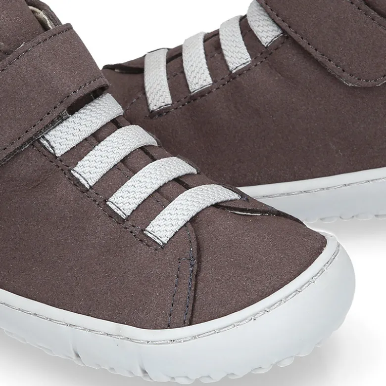 Deportiva alta niños BAREFOOT Okaa Flex con cordones elásticos y cremallera.