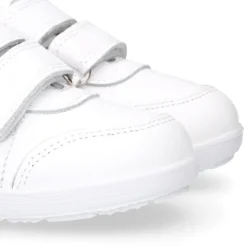Deportiva colegial niños clásica sin cordones y puntera reforzada en piel lavable.