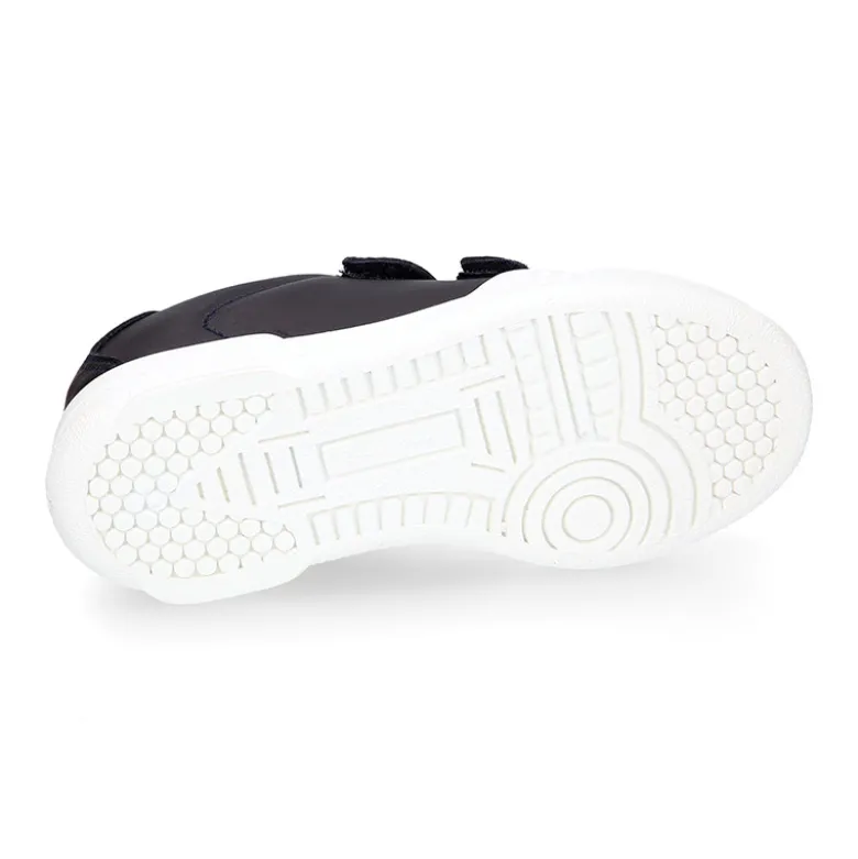 Deportiva colegial niños sin cordones en piel lavable.