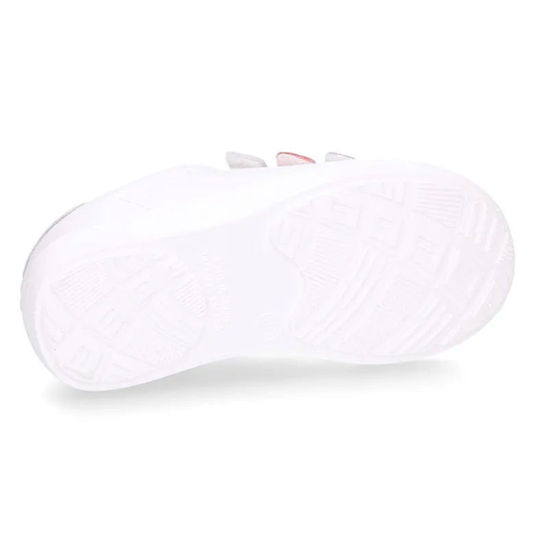 Deportiva niña sin cordones con triple cierre adherente combinado en piel lavable.