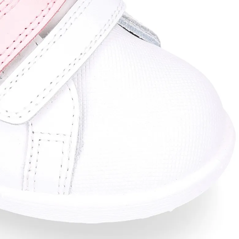 Deportiva niña sin cordones con triple cierre adherente combinado en piel lavable.