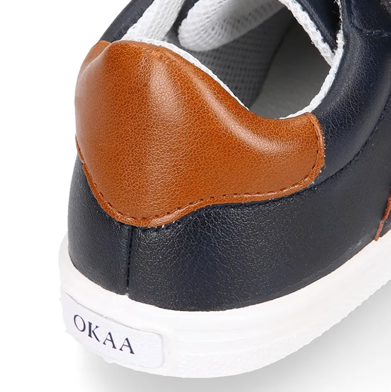 Deportiva niño OKAA FLEX sin cordones en color azul marino con cuero.