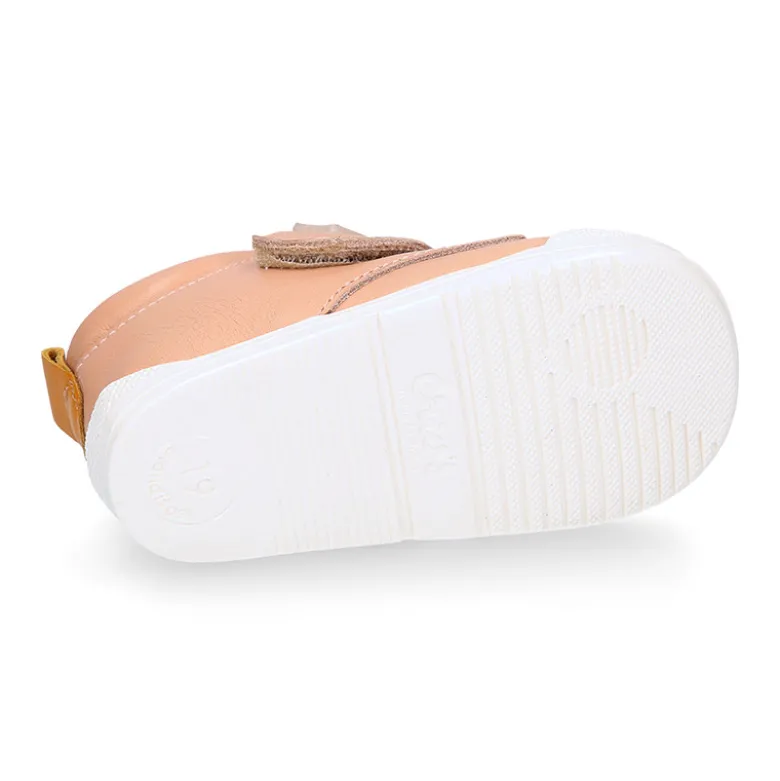 Deportiva niños Blanditos by Crio’s sin cordones en piel.