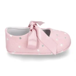 Mercedita bebé con lazo en piel serraje con ESTRELLAS.