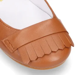 Mercedita niña con FLECOS en piel CUERO.