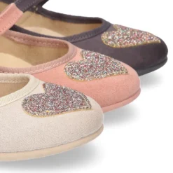 Merceditas OKAA niña en Serratex con CORAZÓN BRILLANTE.