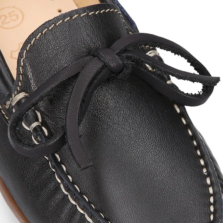 Mocasín con lazos en piel EXTRA SUAVE.