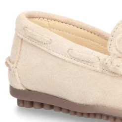 Mocasín con lazos en serraje para mayores piso conductor.