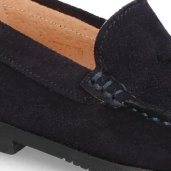 Mocasín niño borlas suela gruesa en piel serraje.