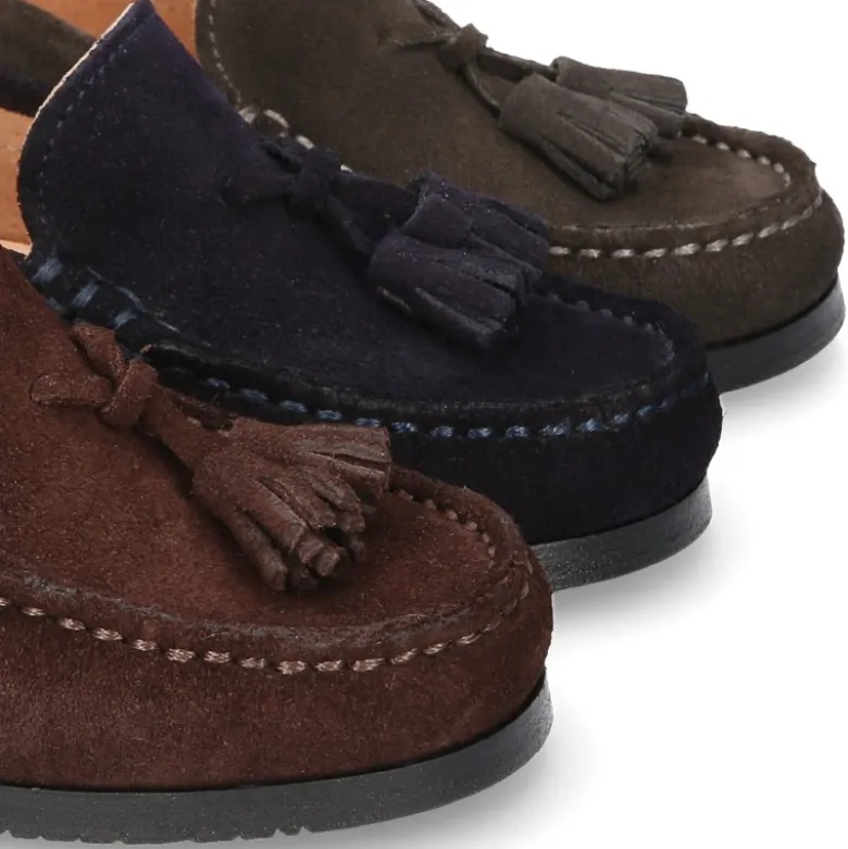 Mocasín niño borlas suela gruesa en piel serraje.