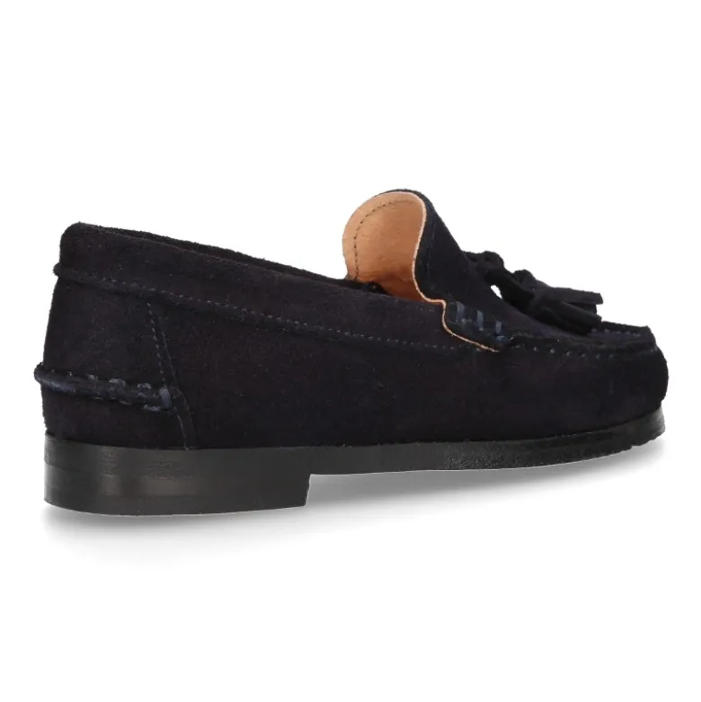 Mocasín niño borlas suela gruesa en piel serraje.