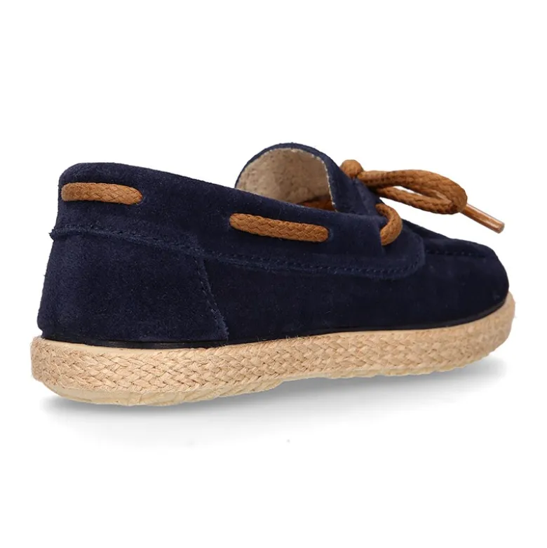 Mocasín niño tipo Alpargata con lazos en piel serraje.