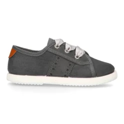 Nueva zapatilla MODA en lona serratex con lazos y picados.