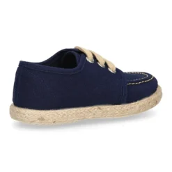 Náutico niño tipo Alpargata en lona con cordones.