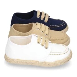 Náutico niño tipo Alpargata en lona con cordones.