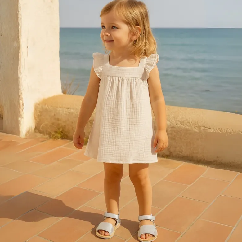 Sandalia BABY NIÑA tipo menorquina con doble cierre adherente en piel con brillos.