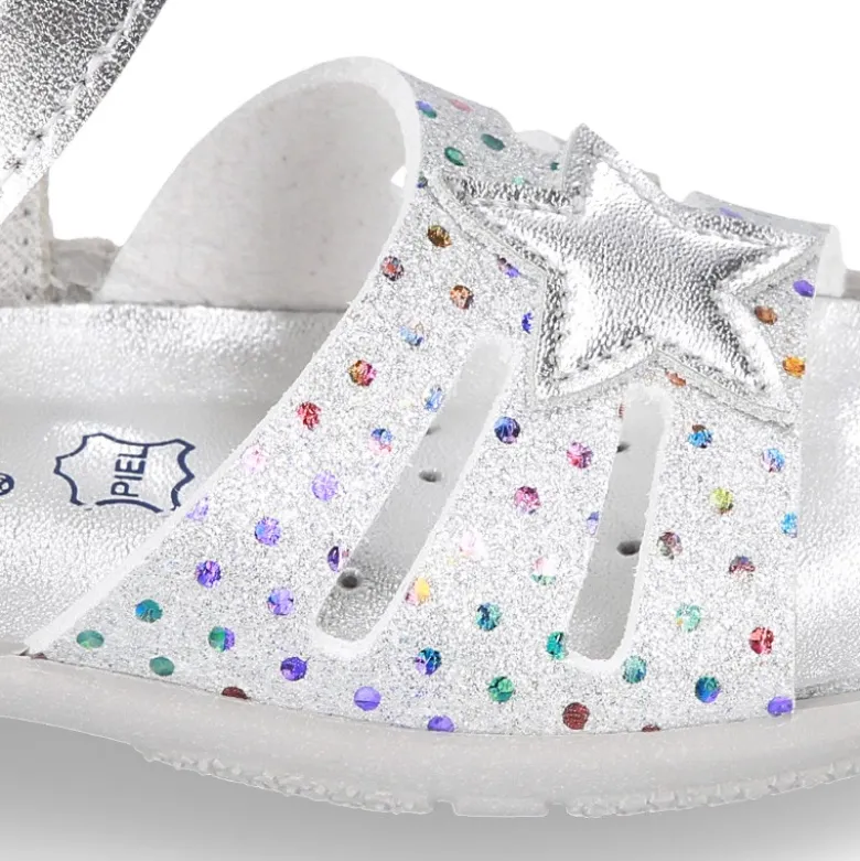 Sandalia Niña peque en piel metalizada con ESTRELLAS y cierre adherente con suela SUPER FLEXIBLE.