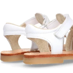 Sandalia niña piel COMBINADA tiras cruzadas con suela super flexible.