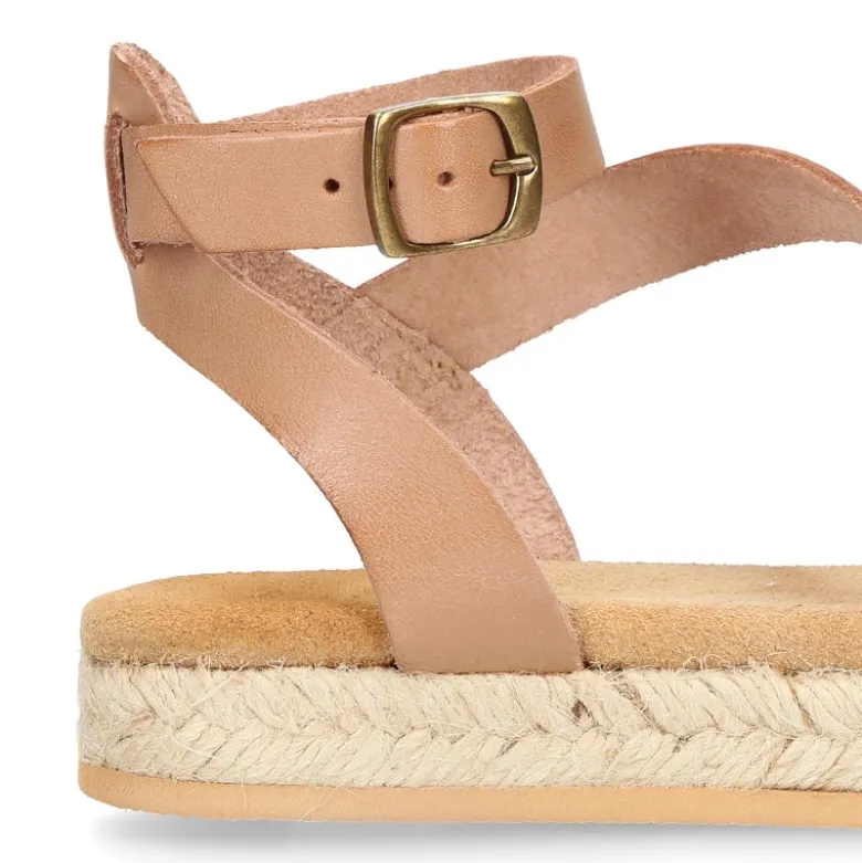 Sandalia Niña tipo alpargata en piel atada al tobillo y diseño trenzado.