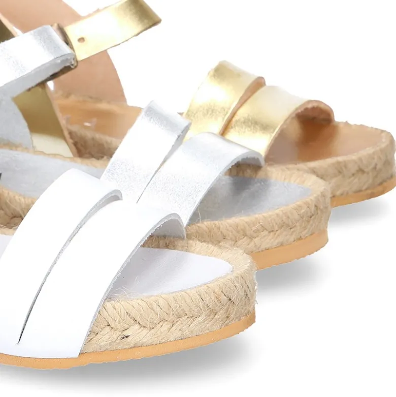 Sandalias niña tipo alpargata con tiras en piel.