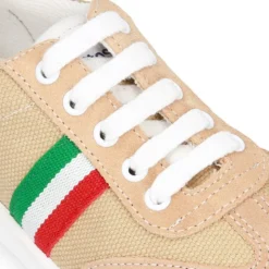 Tenis niño combinado en lona y serraje con cordones.
