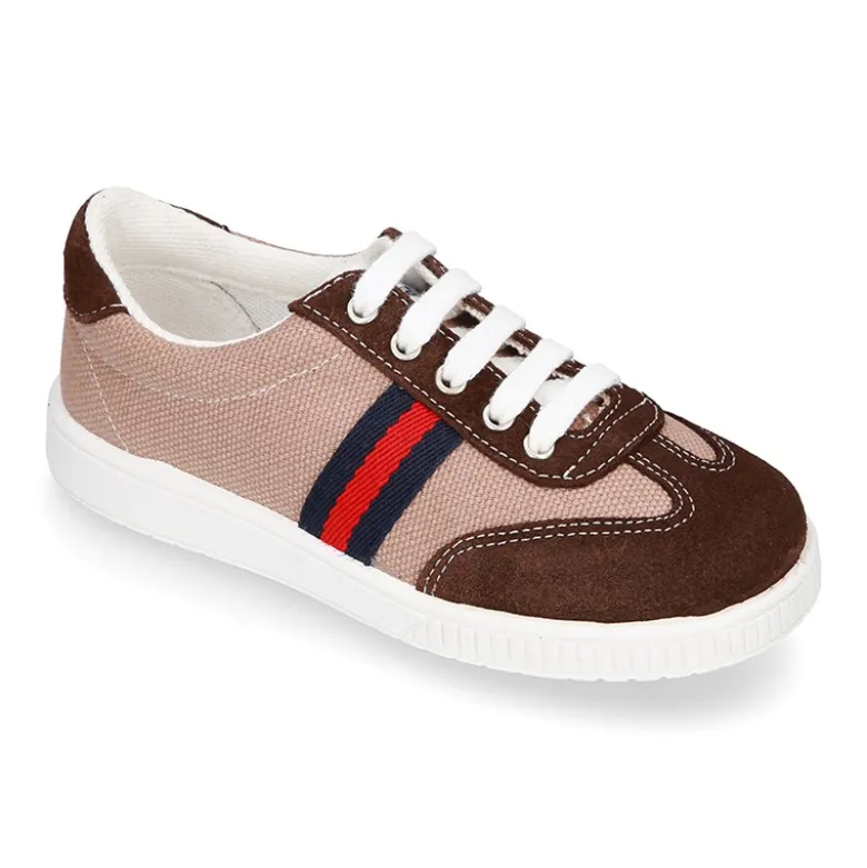 Tenis niño combinado en lona y serraje con cordones.