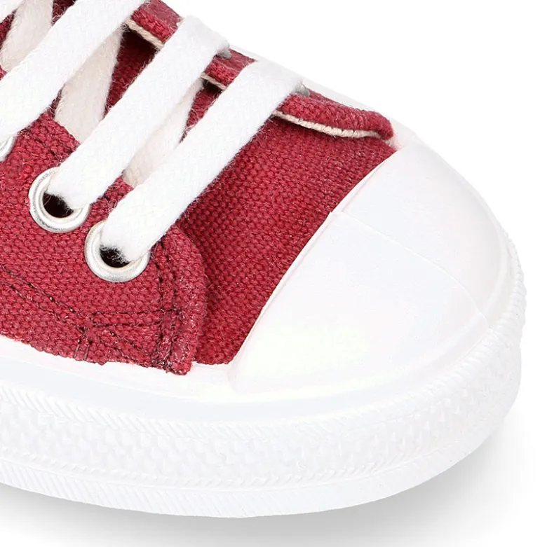 Zapatilla alta niños CASUAL con puntera y cordones en color BURDEOS.